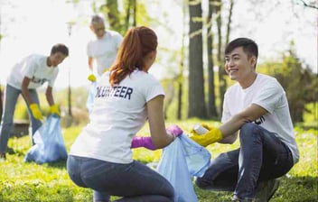 City program volunteers collecting litter